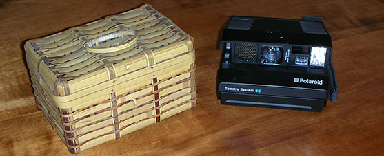 vintage sewing basket and Polaroid camera